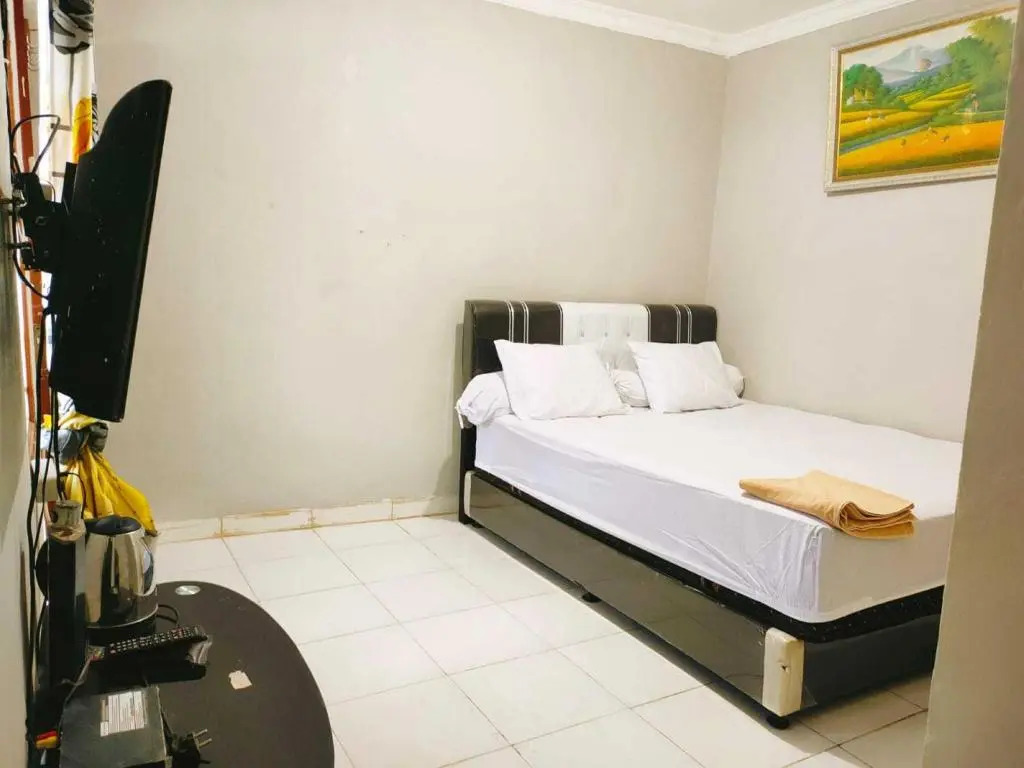 Express O 91277 Atiq Homestay Syariah