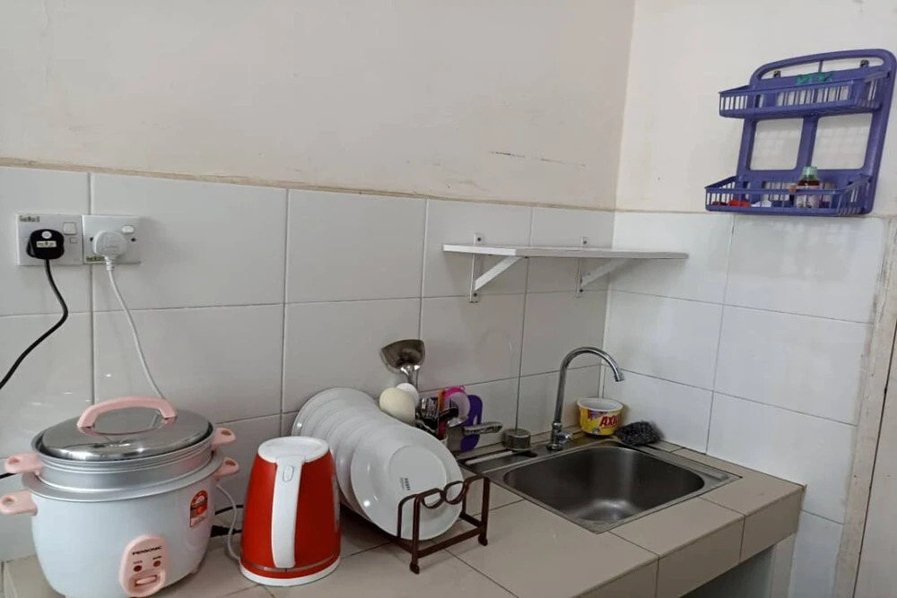 OYO 90437 Homestay Uuc