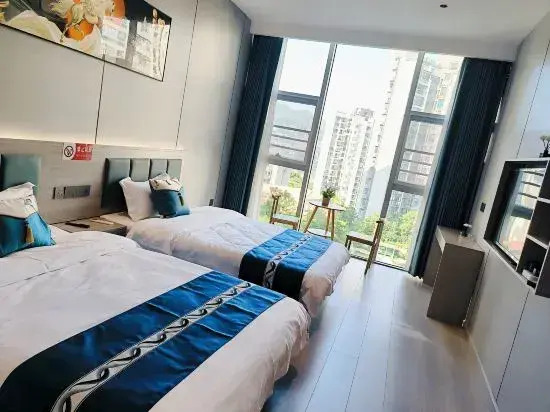 Yutian Homestay (at Panzhihua Wanda Plaza Store)