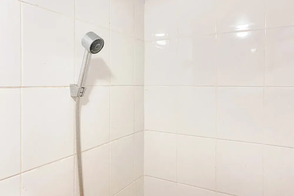 Warm and Well Designed Studio Room at Green Pramuka City Apartment