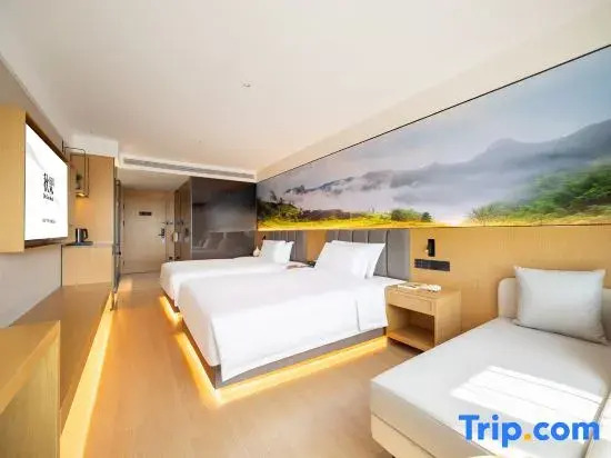 Jizhou Qiuguo Hotel (Harbin West Railway Station & Heilongjiang University Metro Station Branch)