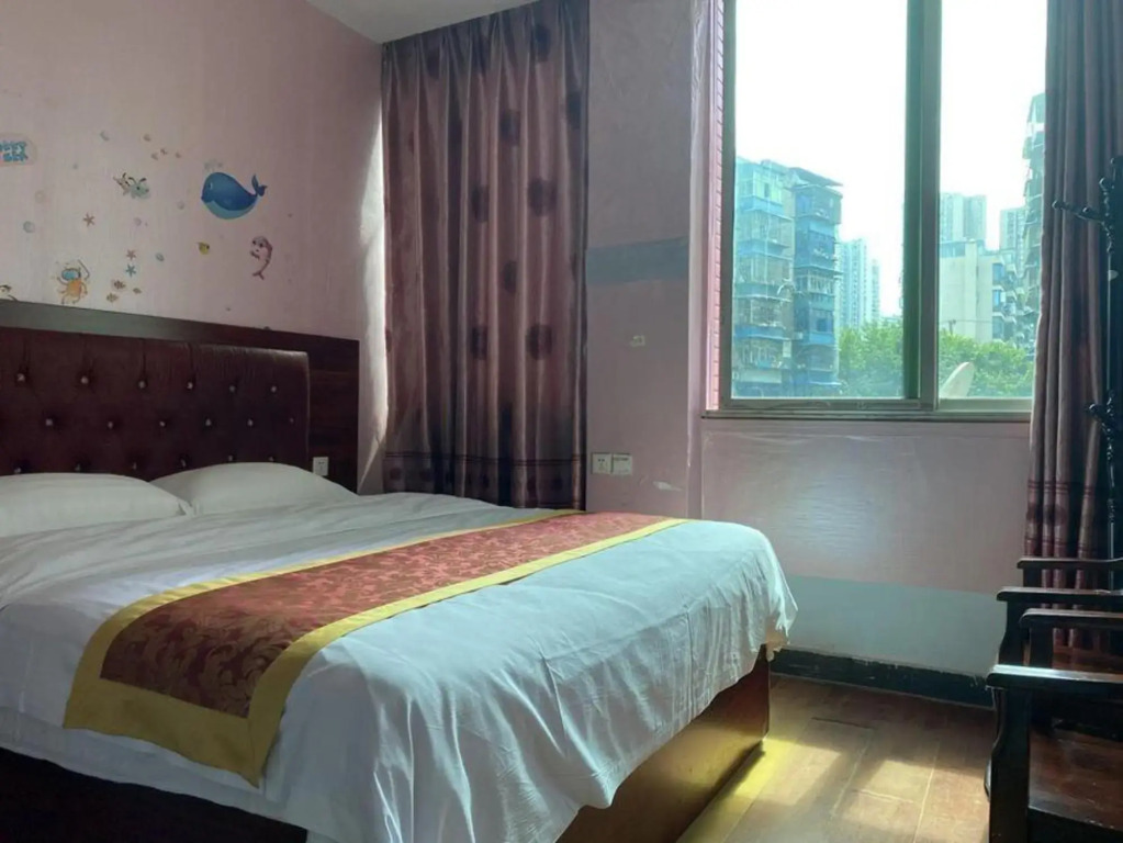 Chongqing Aoxing Hotel (Olympic Sports Center Light Rail Station)