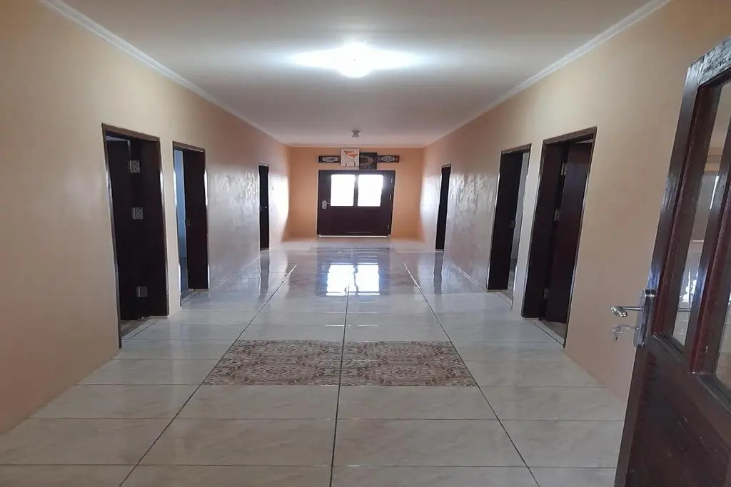 SPOT ON 91616 Kharisma Guest House