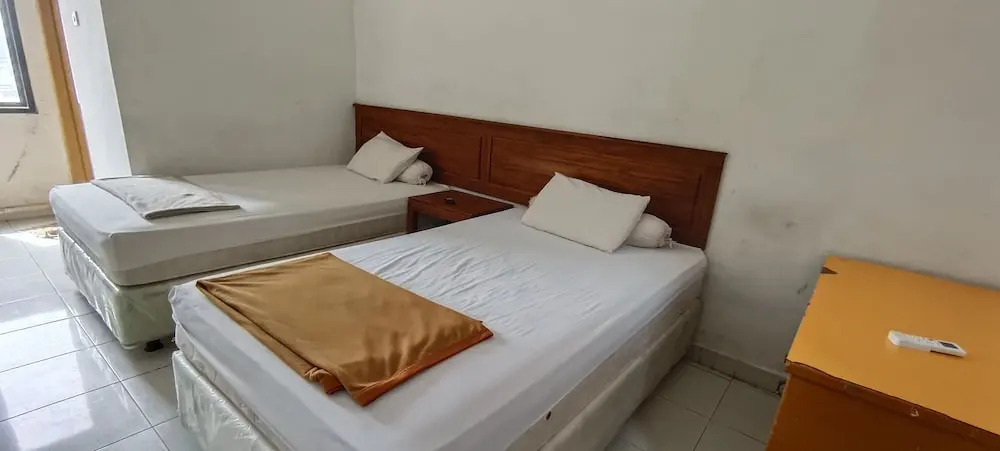 Hotel O Wisma Hamalau SyariahNearPulau Bromo Pedestrian Bridge