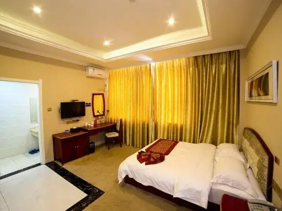 Xingshan Luoma Holiday Hotel