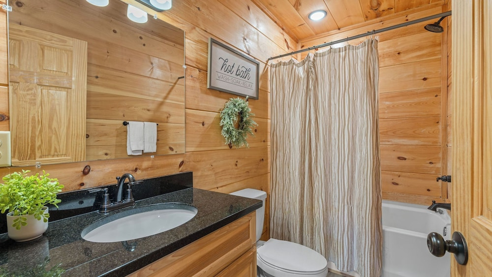 Hot Tub, Game Loft, Open Living, Minutes to Downtown Gatlinburg Whisper Cabin by Avantstay