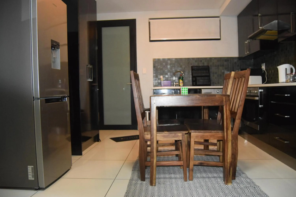 Highrise Windhoek apartment with skyline view, pool and gym
