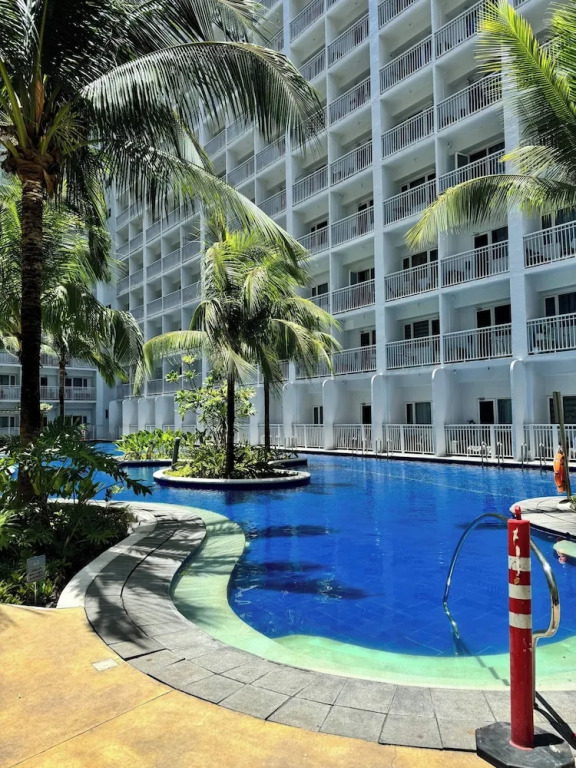 Relax in Pasay City's Best Kept Secret - Spacious Condo With Garden View