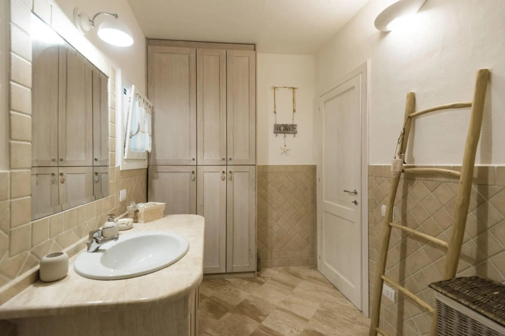 It features a large living area with fully equipped open kitchen and access to the covered terrace d-S'ABBA 1