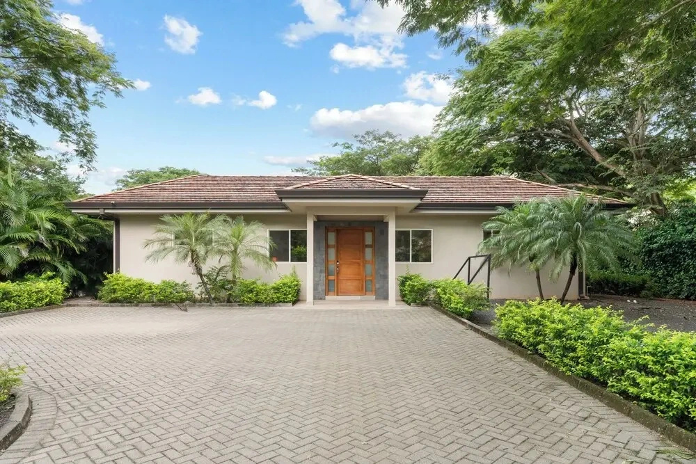 Beautiful home in a gated Neighborhood, Walking Distance to Beach with Garden