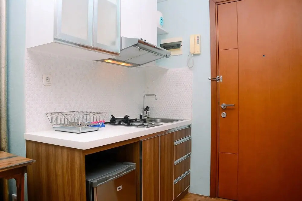 Modern and Comfy 1BR Apartment at Woodland Park Residence By Travelio