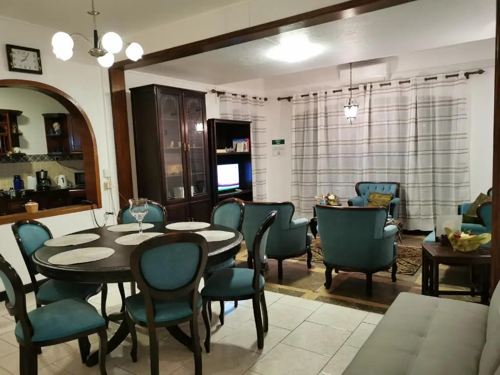 R&G Justlikehome Apartment 1 with blue sofa set and Apartment 2 with Garden View with brown sofa set
