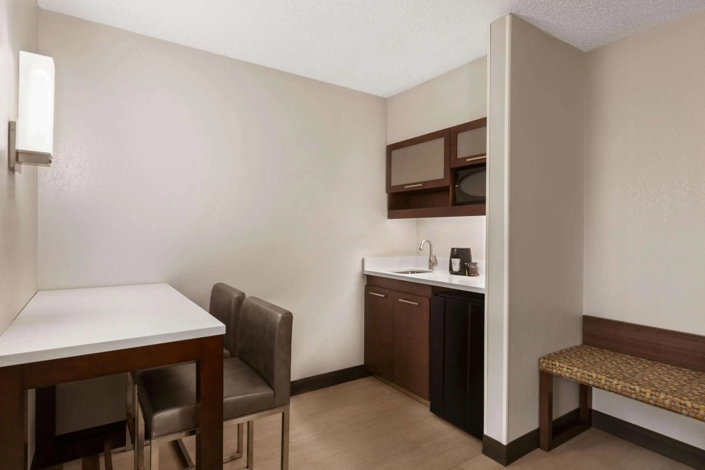 Ramada by Wyndham Suites Orlando Airport- Free Airport Shuttle