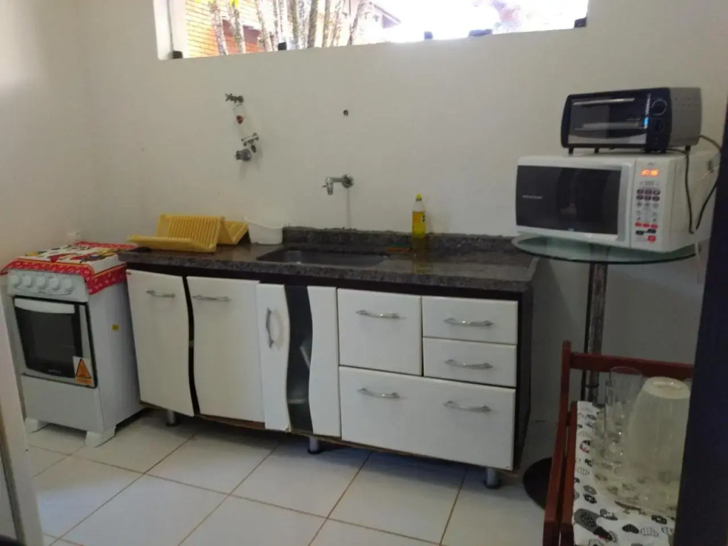 Casa com piscina em condomínio fechado no Guarujá