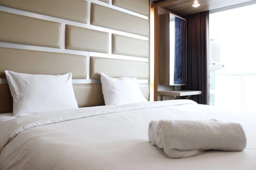 Trendy & Comfy Studio at Tamansari la Grande Apartment