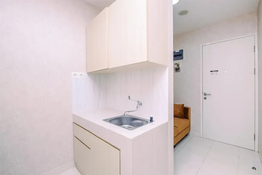 Cozy 1BR at Sentul Tower Apartment