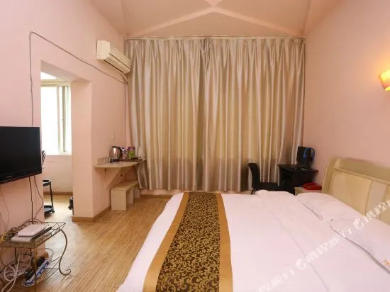 Kuaile Yijia Business Hotel