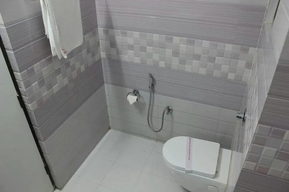 JK Rooms 101 Hotel Asian Inn