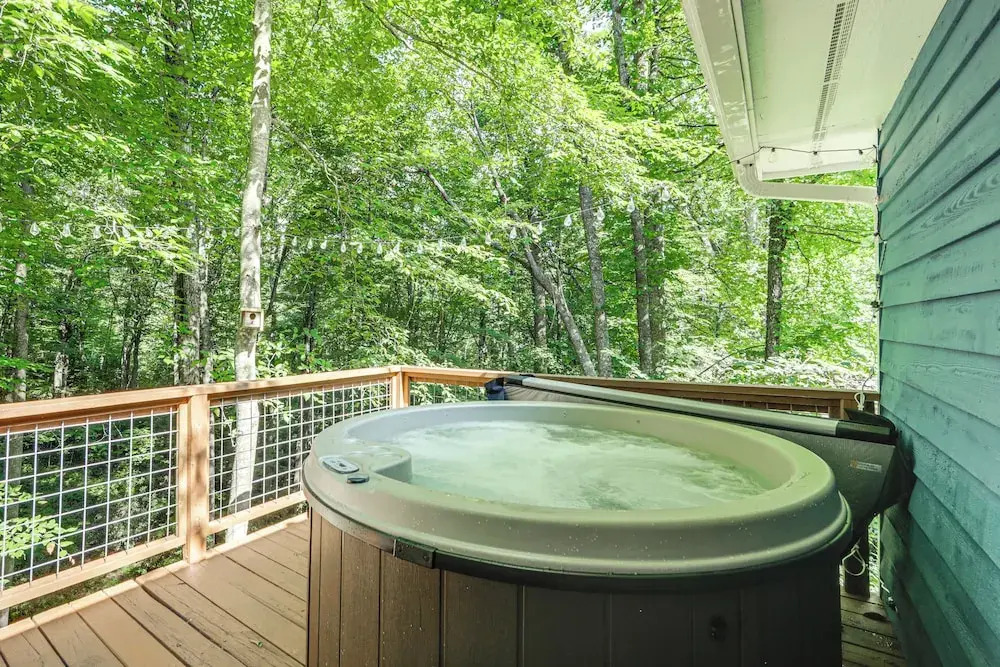 Creek View + Hot Tub: Woodsy Maggie Valley Cottage