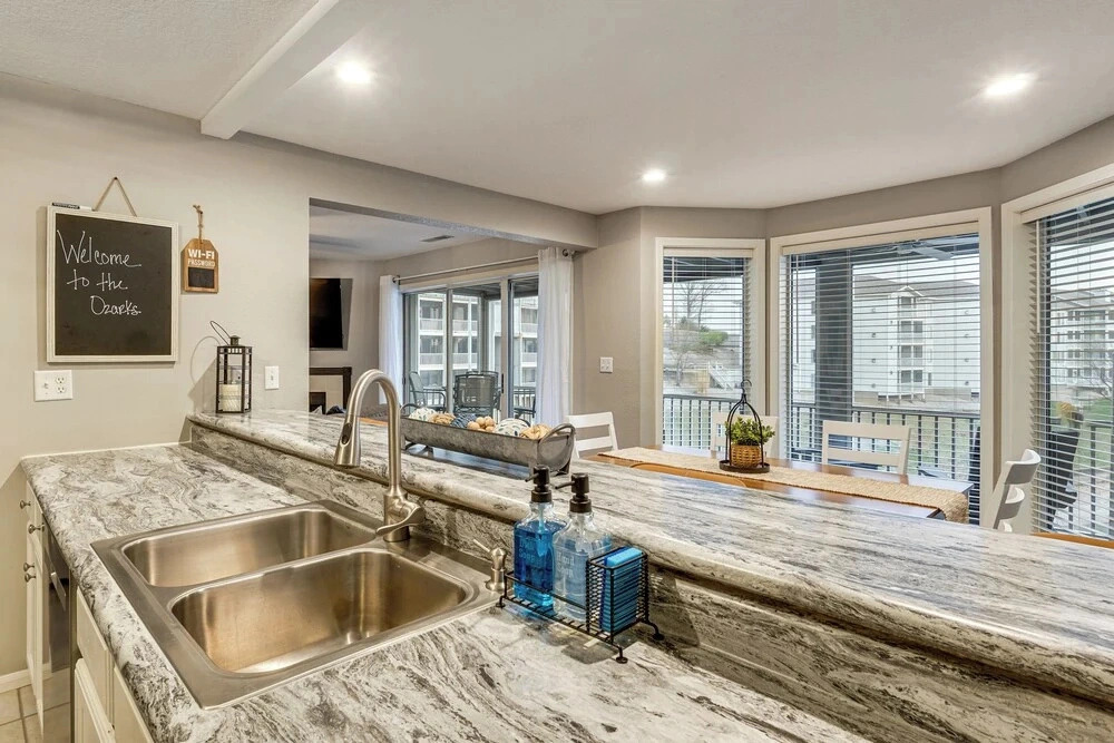 Lakefront Village of Four Seasons Gem w/ Balcony