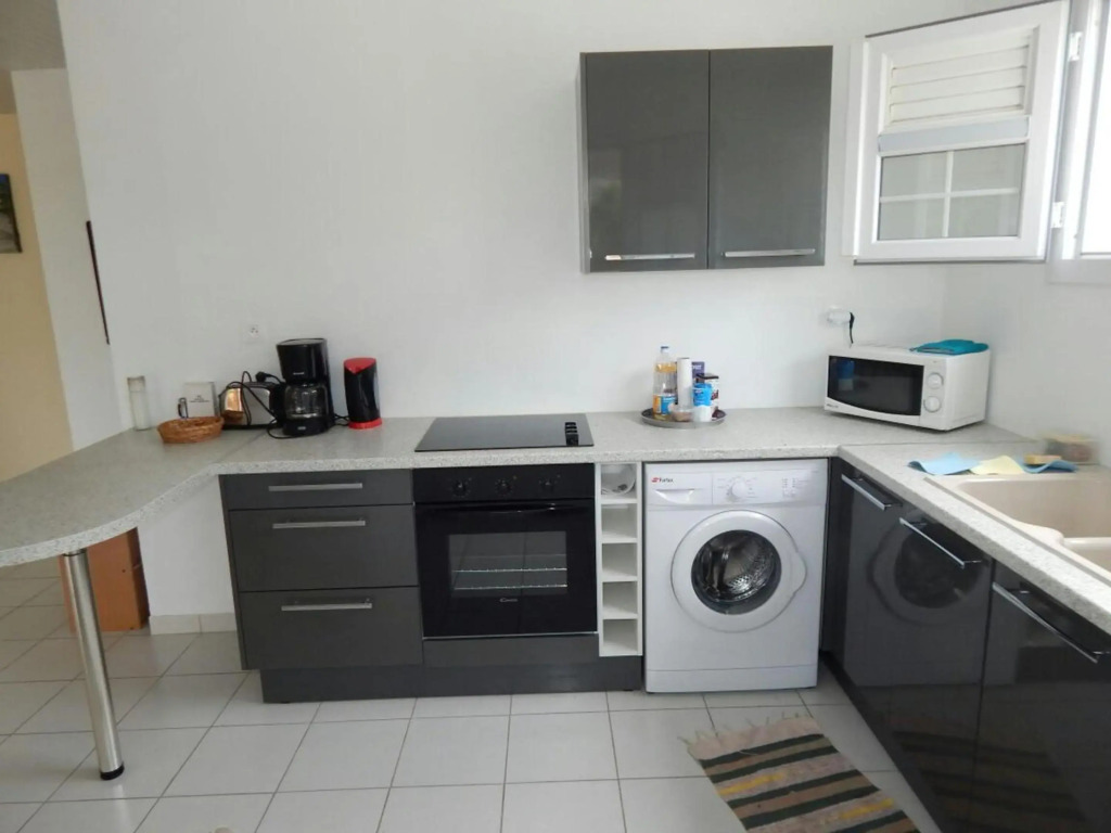 Maison de 2 chambres avec jardin clos et wifi a Sainte Anne a 5 km de la plage