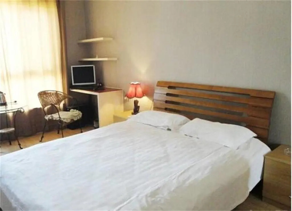 Weilai Yiju Apartment Hotel