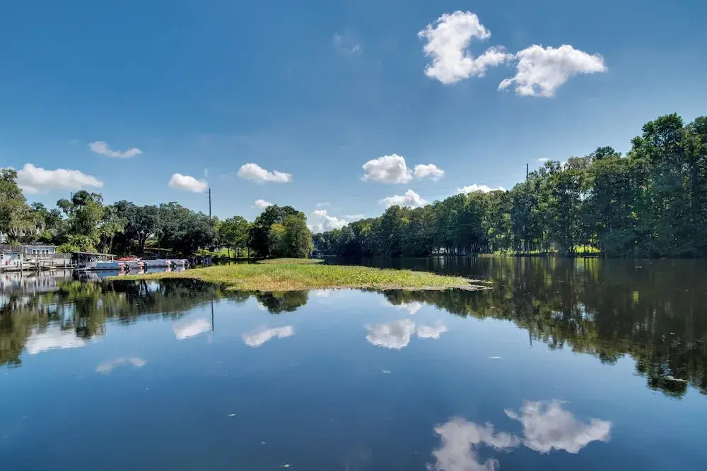 Docks + Balcony: Peaceful River Abode in Dunnellon