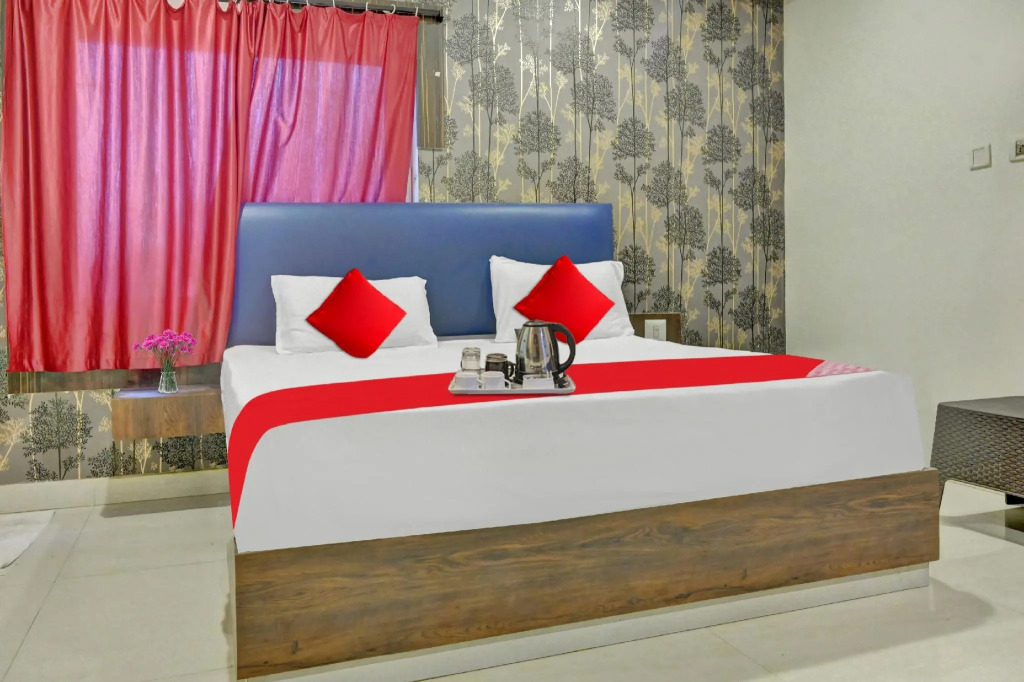 Eesha Ncore Rooms by Oyo