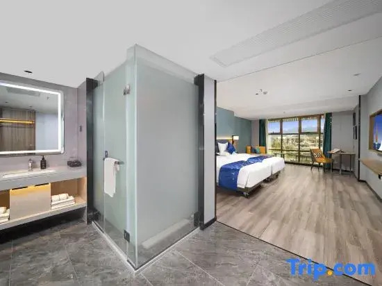Yeste Hotel (Du'an High - speed Railway Station Binjiang Zhuangyuan Food Street Branch)