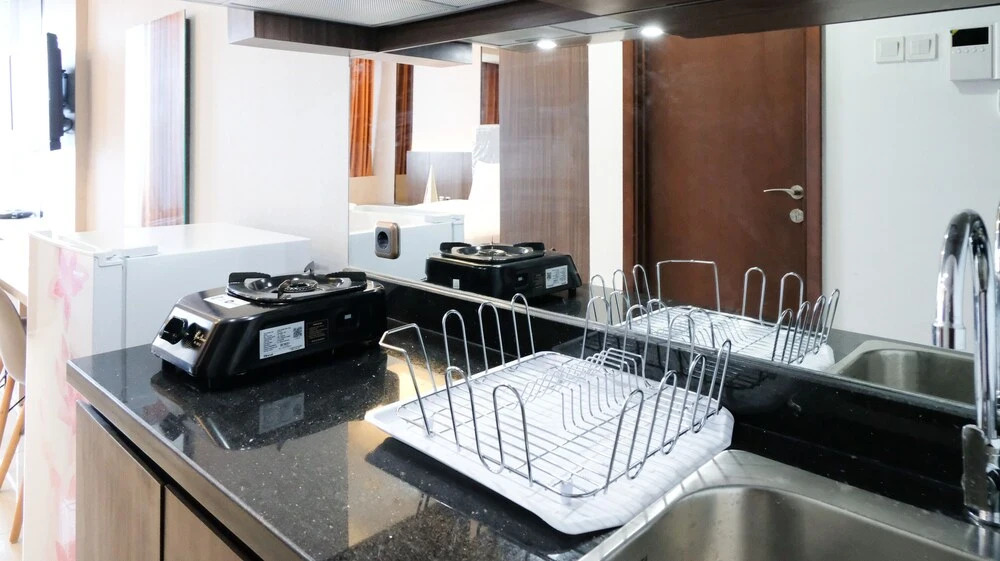 Luxurious Studio With Long Golf View At Grand Sungkono Lagoon Apartment