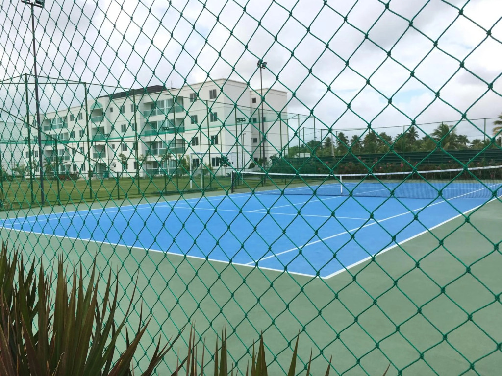 Muro Alto Condomínio Clube - Flats completos para a família por Yolo
