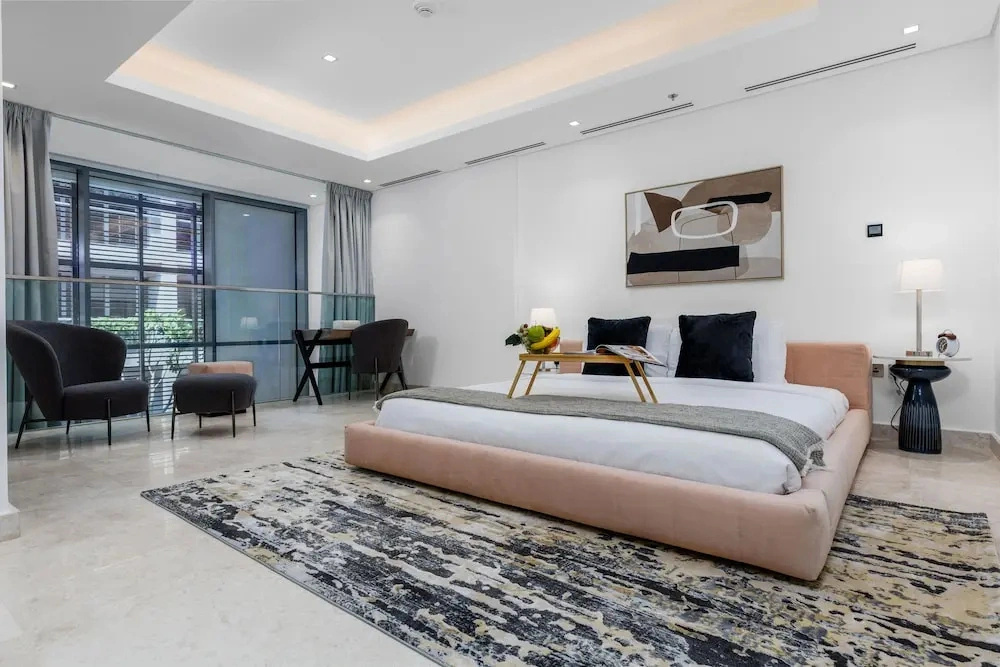 Maison Privee - Exquisite Duplex with Private Patio & Loft Living
