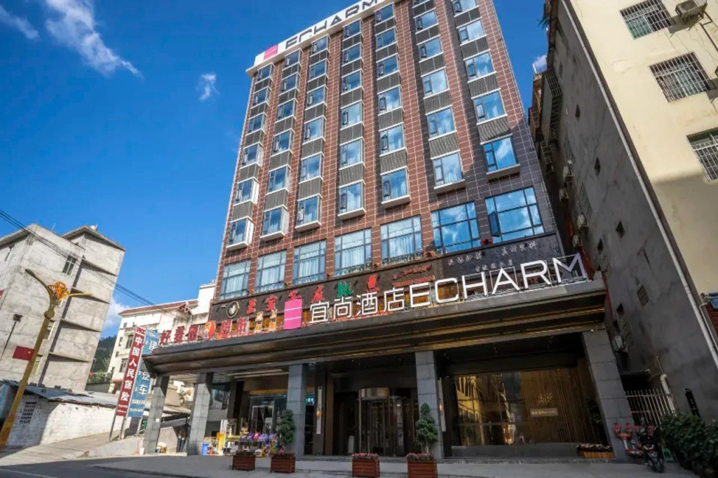 Echarm Hotel (Leibo tourism passenger transport center station)