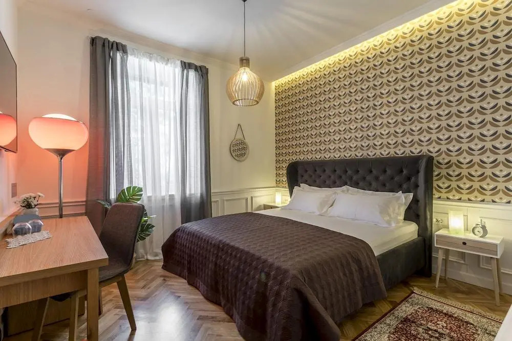 Evala luxury rooms with pool and garden