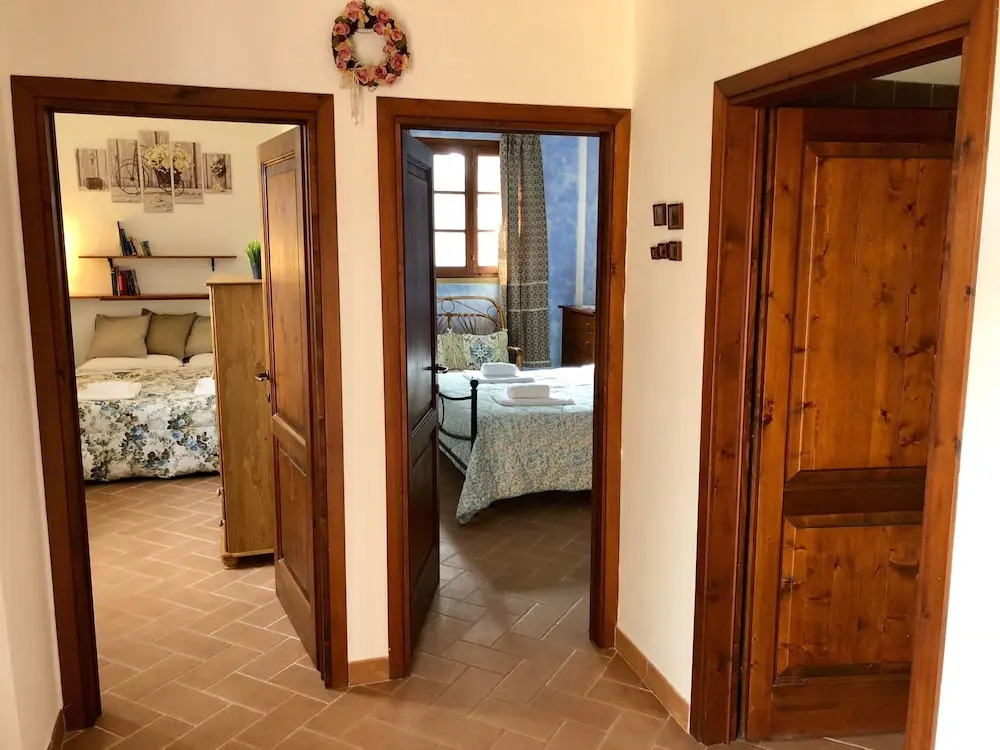 Casetta Luna e Sole Vista Colline Toscane WiFi Ultra Giardino e Ricarica EV