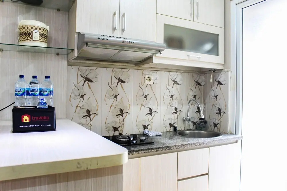 Fully Furnished and Cozy Design 1BR Green Pramuka Apartment