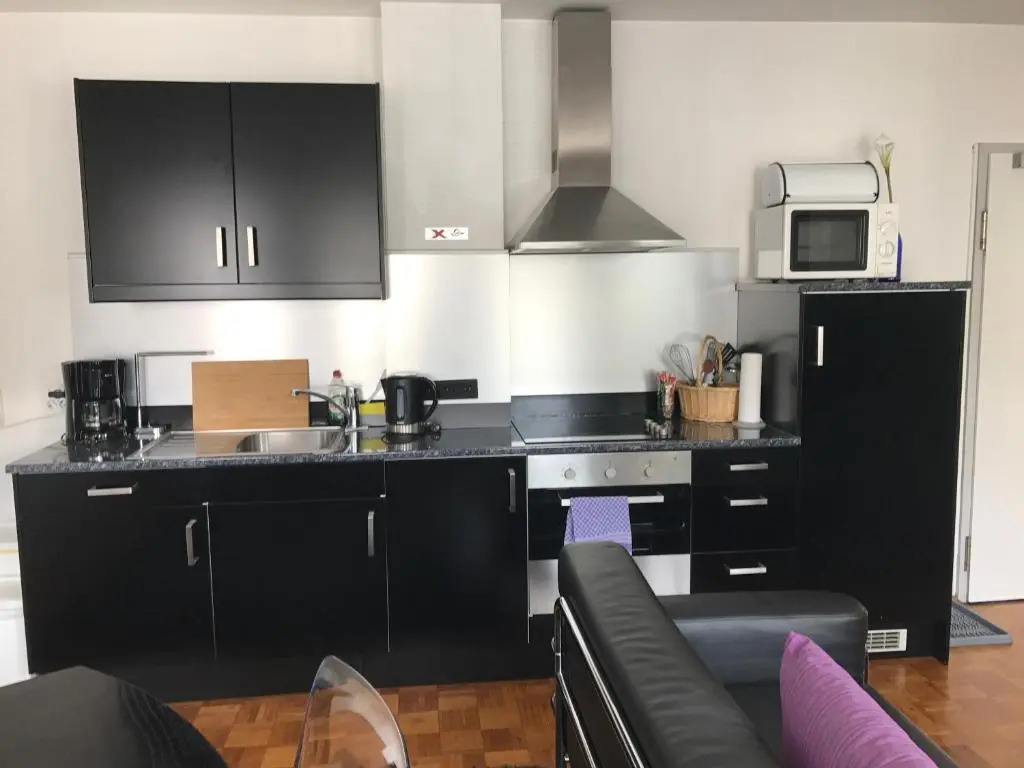 Apartmenthaus Zentrum Komfort Apartments mit Miniküchen verschiedener Größen