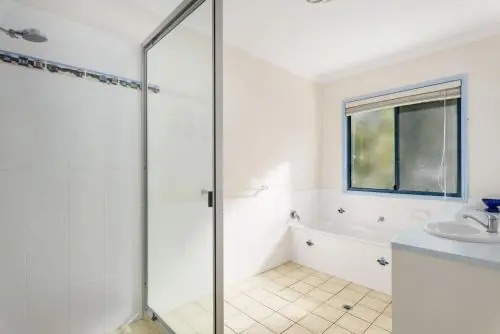 12 Ibis Court Highset Beach House With Natural Bushland Gardens And Covered Decks