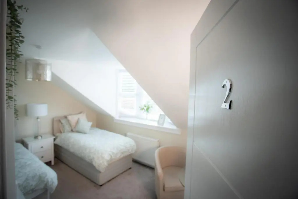 3 Private bedrooms attached to hosts home Free parking