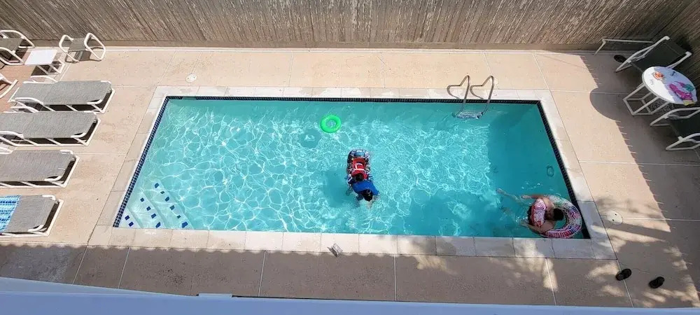 Brand New Inside 1/2 Block to Beach Fun Pool 2 Bedroom Home by Redawning