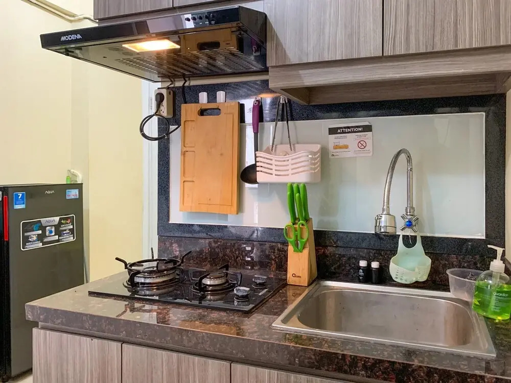 Homey And Tidy Studio At Green Pramuka City Apartment