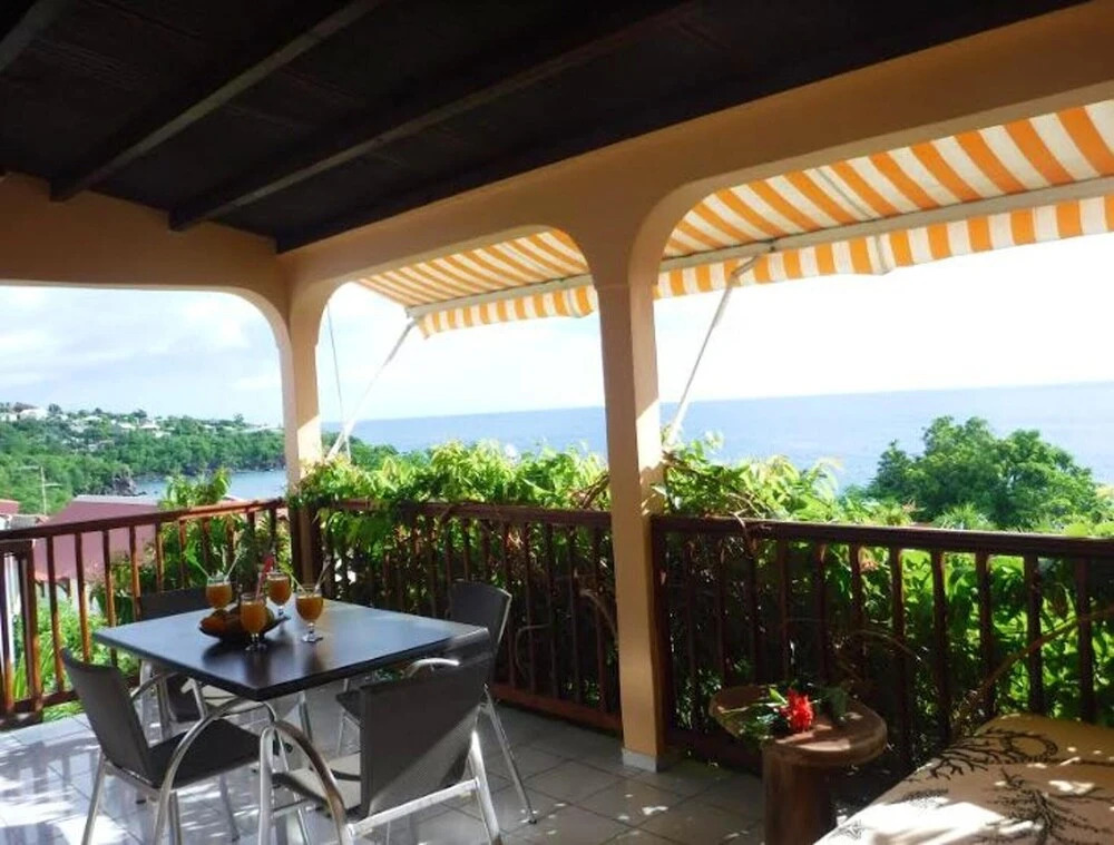 Bungalow with 2 Bedrooms in Bouillante, with Wonderful Sea View, Shared Pool, Enclosed Garden - 70 M From the Beach