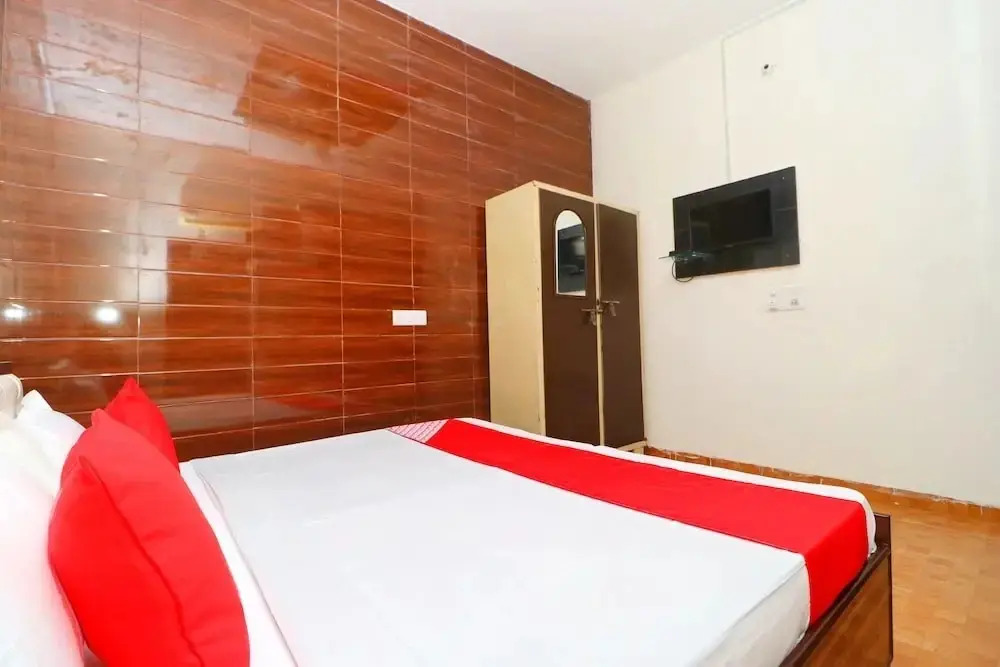 Raj Apartments  by OYO Rooms