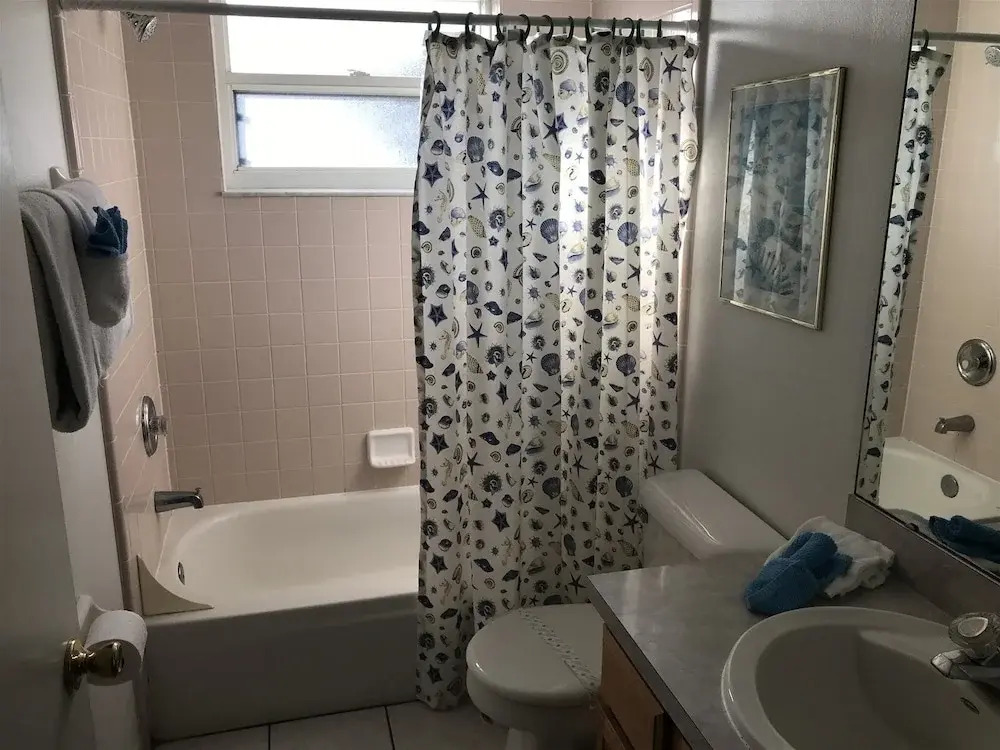3 Bedroom Home With Private Screened Pool With Rock Waterfall Feature and Gameroom by Florida Dream Homes