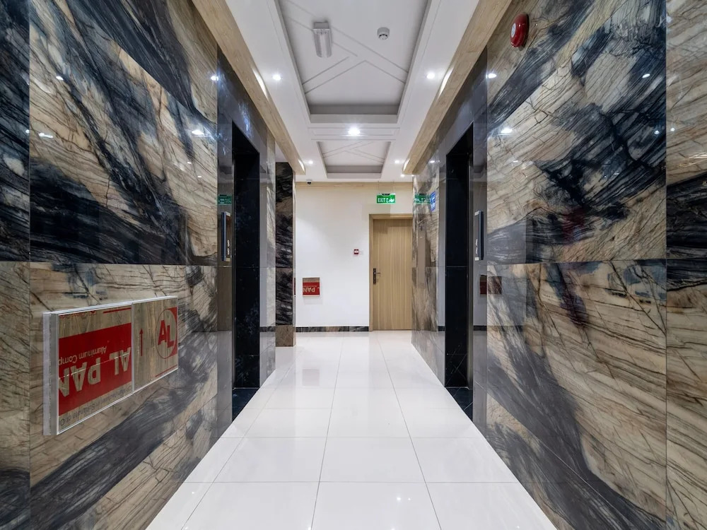 OYO Townhouse 156 Rose Hotel Apartments.