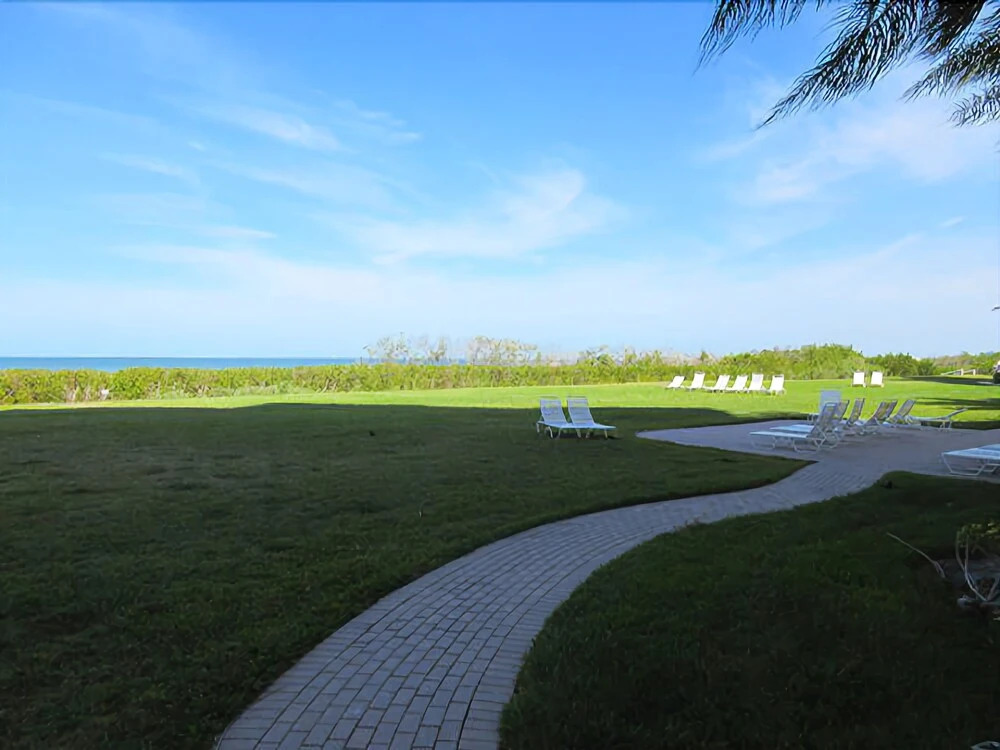 Estero Beach and Tennis 701A by RedAwning