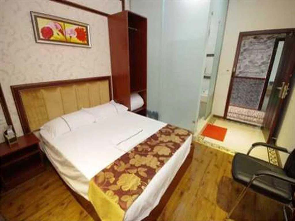 Qiqi Business Inn