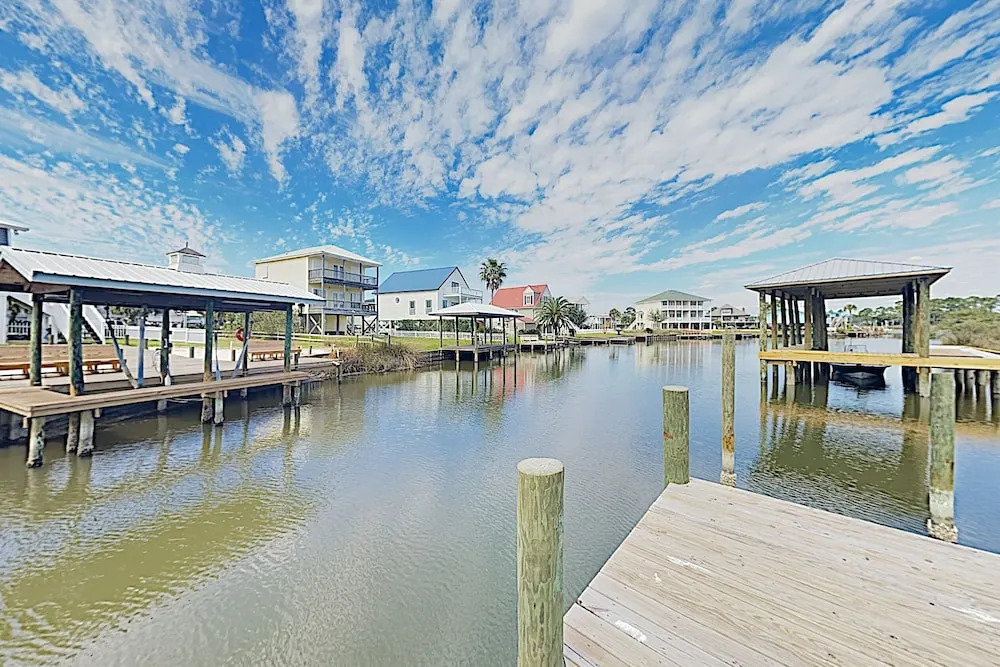 New Listing! Lagoon-front W/ Pool, Deck 2 Bedroom Townhouse
