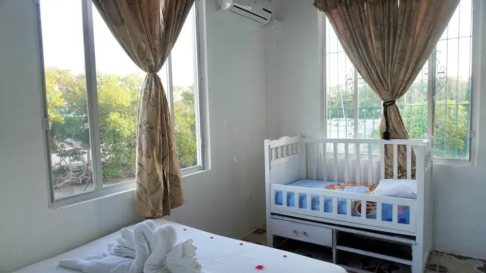 See Belize Waterside Sea View 2-bedroom Apartment w Balcony, Pool & Deck 2nd FL