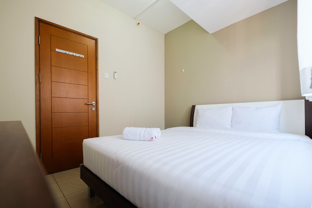 2 Bedrooms at Gading Greenhill Apartment by Travelio